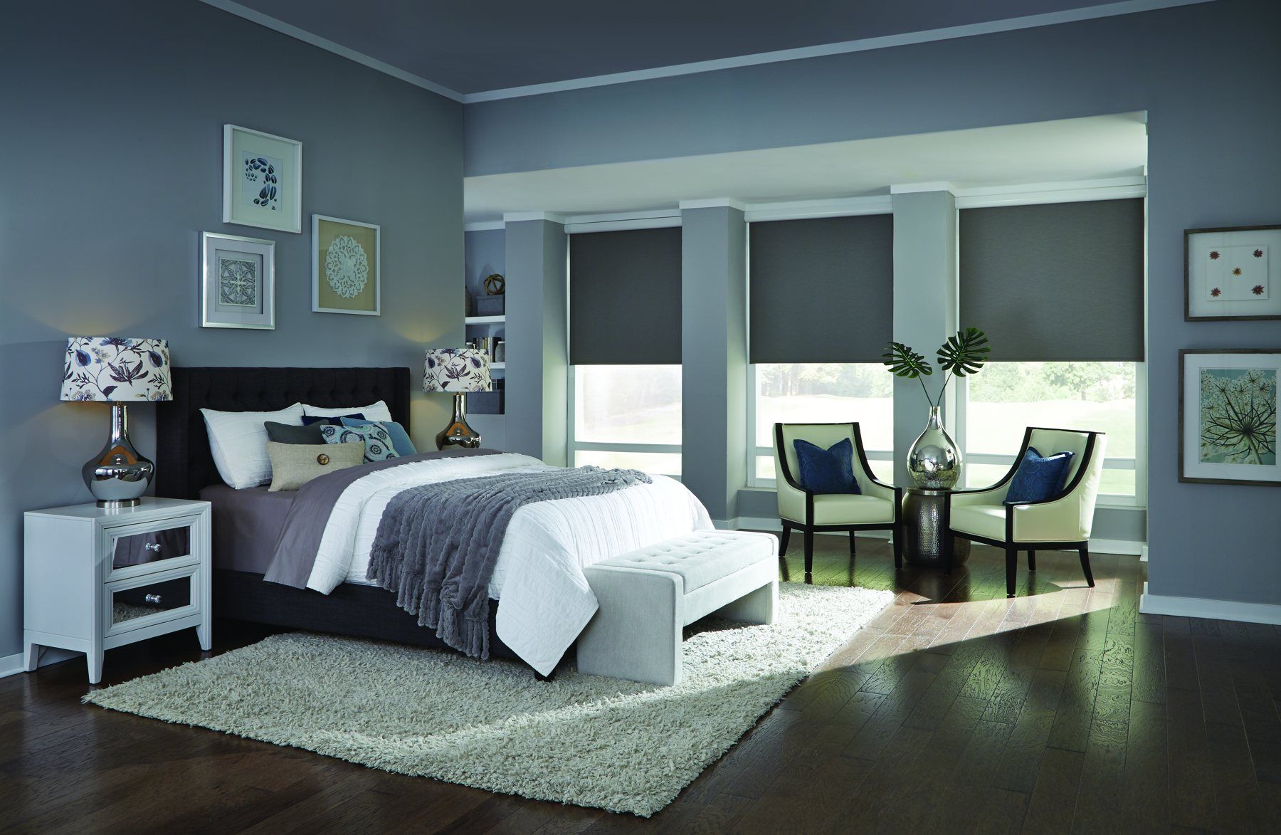 Lutron Sivoia QS blackout shades in a bedroom